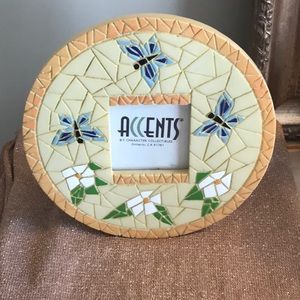 For a small picture.  Pretty mosaic frame. New